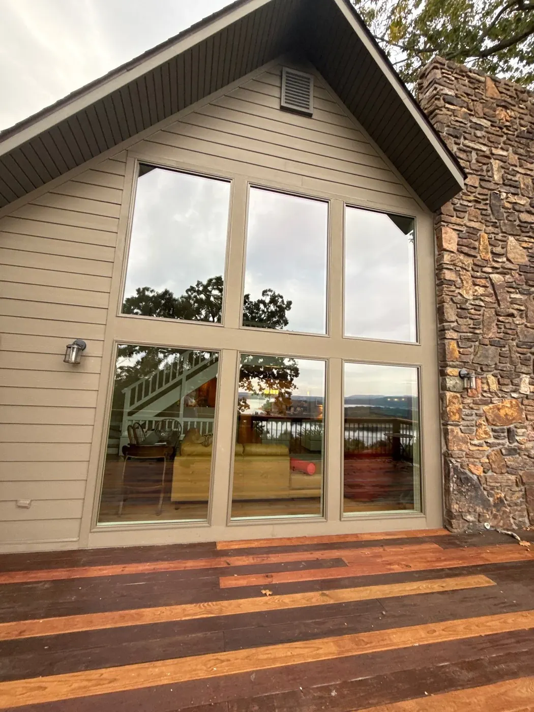 After: the replacement window wall creates a brighter, more open finished room.